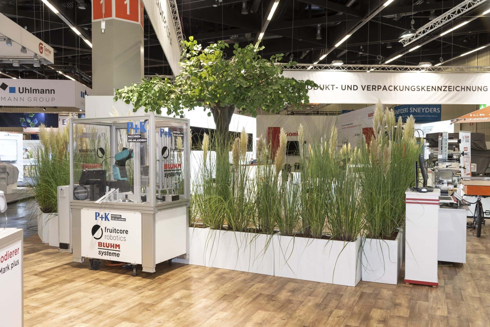Messebau Nürnberg – Bluhm Systeme Messestand mit automatisierten Kennzeichnungssystemen auf der Biofach.
