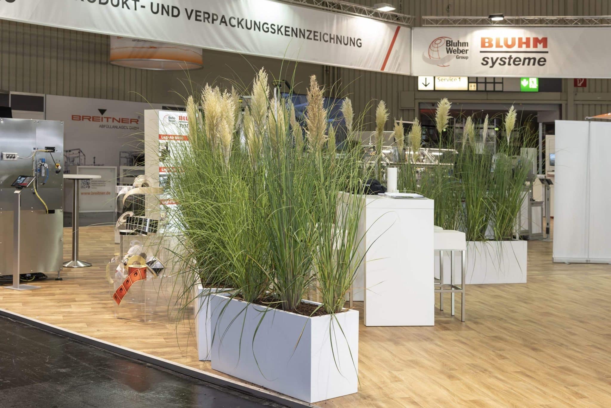 Pflanzen und Kennzeichnungssysteme am Messestand von Bluhm Systeme auf der Biofach Nürnberg – Messebau Nürnberg.