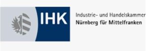 Logo der Industrie- und Handelskammer Nürnberg für Mittelfranken. Links ein graues Emblem mit Adler und Schild. Rechts „IHK“ in Weiß auf blauem Grund und der Name der Organisation in schwarzer Schrift auf hellem Grund.
