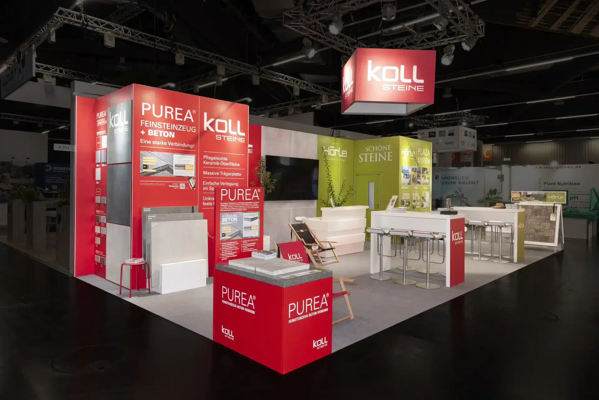 Koll Steine Messestand mit Purea Feinsteinzeug und Betonlösungen auf der GalaBau Nürnberg – moderner Messebau Nürnberg